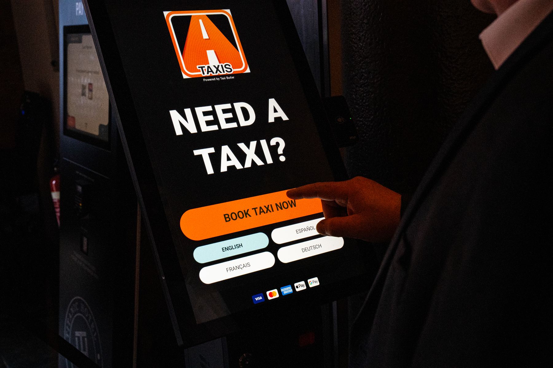Booking an Alpha taxi on a touchscreen kiosk